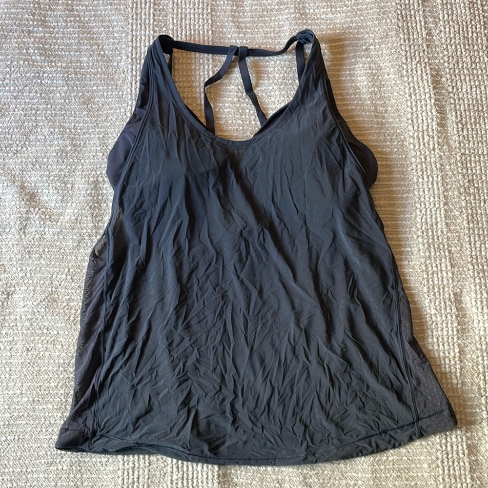 Lululemon workout top with bra, size 10, grey with mesh overlay.